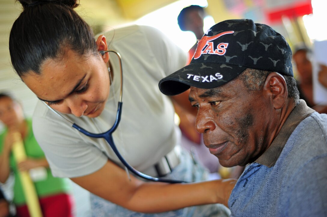 INDEPENDENCE, Belize – U.S. Air Force 1st Lt. Arlene Prada, Medical Element nurse, conducts a screening for a Belizean man during the final day of a joint medical readiness training exercise here Feb. 29. In 2011, Joint Task Force Bravo, Soto Cano Air Base, Honduras provided general medical care to 14,401 patients and dental care to 1,061 patients for a total of 15,462 individuals receiving much-needed assistance. (U.S. Air Force photo/Staff Sgt. Bryan Franks)
