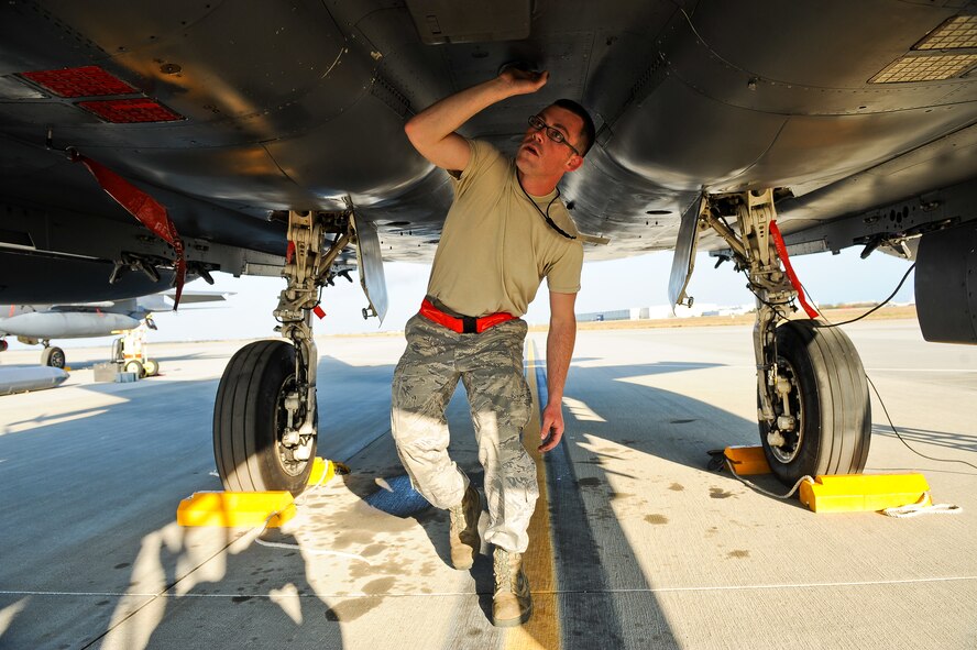 U.S. Air Force Staff Sgt. Jason Ballou performs a weapons supervisory post load inspection on an F-15E Strike Eagle during exercise Global Guardian 2012 at the National Guard Combat Readiness Training Center in Savannah, Ga., Feb. 22, 2012. This exercise prepares participants, which include Army, Air Force and coalition forces, to deploy, conduct direct and indirect combat operations, and redeploy safely to their home base. Ballou is a 333rd Aircraft Maintenance Unit weapons load team chief. (U.S. Air Force photo/Master Sgt. Roger Parsons/Released)