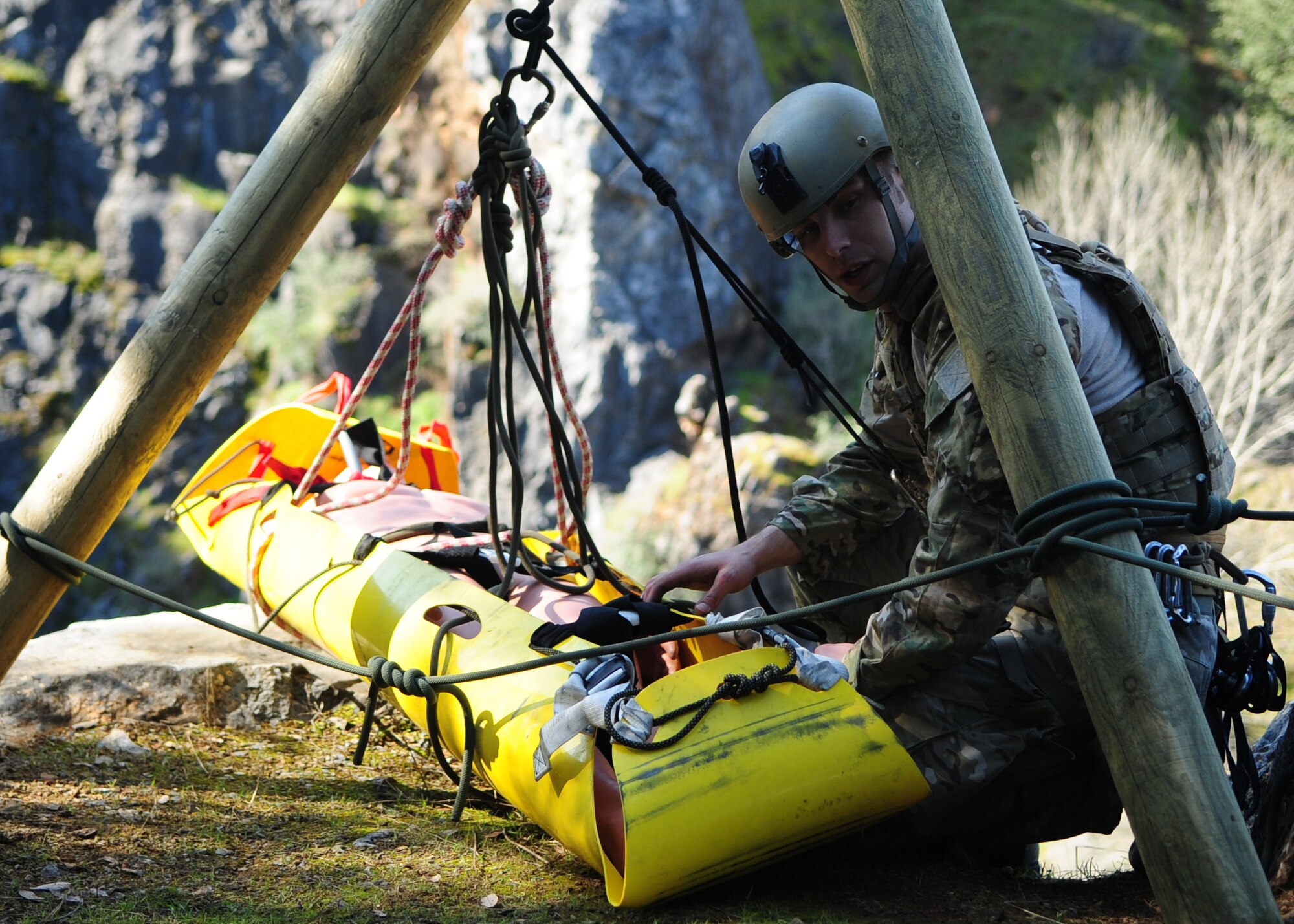 Staff Sgt. Scott Love, 9th Civil Engineer Squadron explosive ordnance disposal technician, prepares to ascend a 200 foot cliff during training in Auburn, Calif., Feb. 17, 2012. Beale's EOD technicians train constantly for deployment in mountainous terrain. (U.S. Air Force photo by Senior Airman Shawn Nickel/Released)