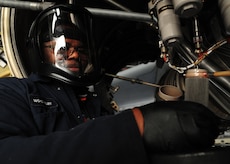 Norman Riley performs a filter inspection on a C-17 Globemaster III at the Home Station Check hangar at Joint Base Charleston, S.C., Feb. 21, 2012. The inspections are performed on each engine of every aircraft in the HSC. Riley is a 437th Maintenance Squadron aircraft hydraulics technician. (U.S. Air Force photo/Staff Sgt. Katie Gieratz)