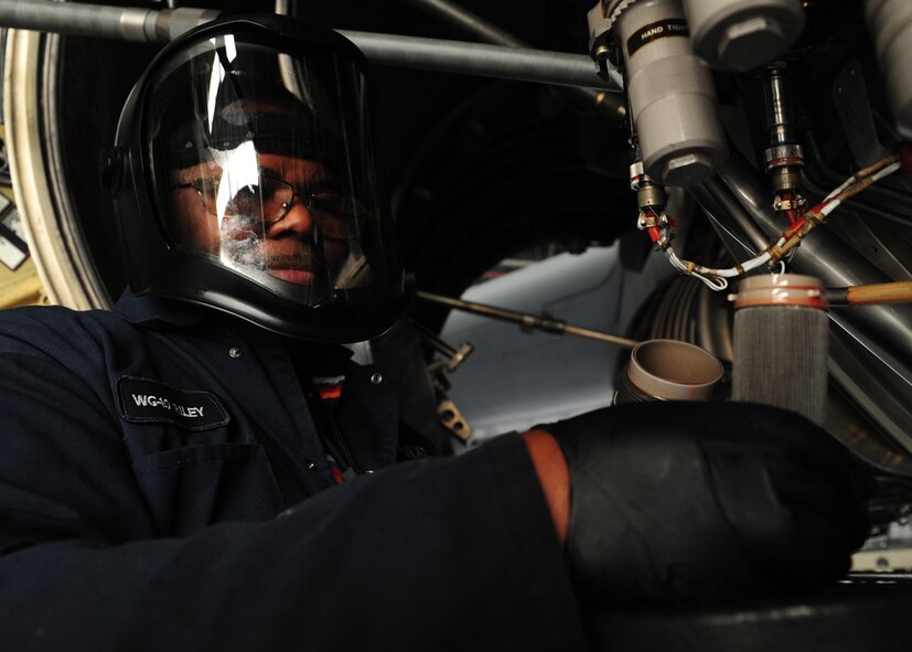 Norman Riley performs a filter inspection on a C-17 Globemaster III at the Home Station Check hangar at Joint Base Charleston, S.C., Feb. 21, 2012. The inspections are performed on each engine of every aircraft in the HSC. Riley is a 437th Maintenance Squadron aircraft hydraulics technician. (U.S. Air Force photo/Staff Sgt. Katie Gieratz)