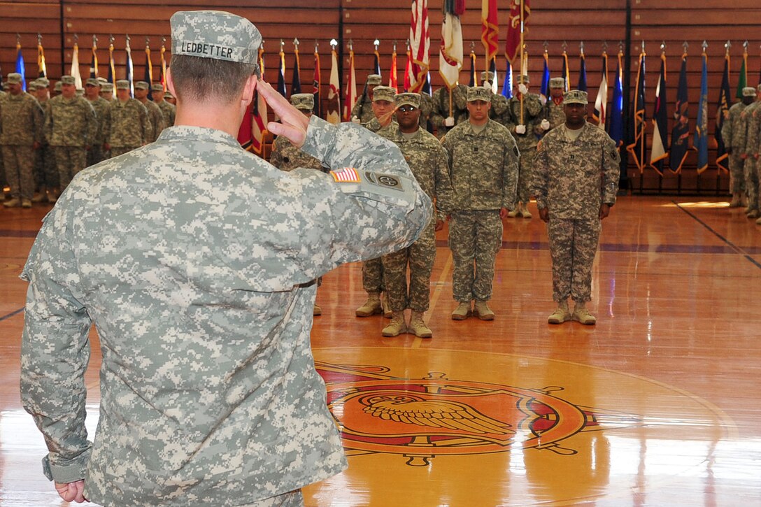 U.S. Army Lt. Col. Stephen W. Ledbetter, 53rd Transportation Battalion commander, renders a salute to his battalion during a change of command ceremony at Anderson Field House, Fort Eustis, Va., Feb. 28, 2012. Ledbetter’s previous position was chief of operations at Fort Bragg, N.C. (U.S. Air Force Photo by Staff Sgt. Ashley Hawkins/Released)