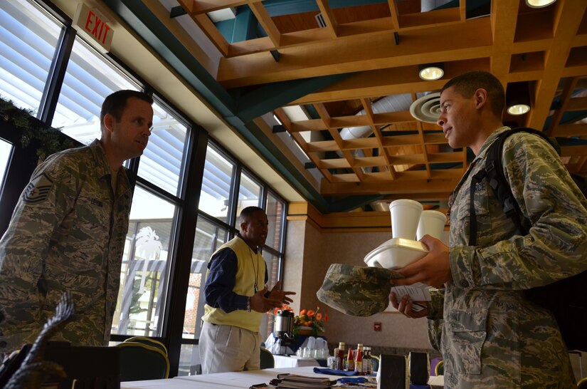 Master Sgt. Donald Leydig answers an Airman’s question during a monthly ‘Question and Answer’ session Feb. 21 at Joint Base Charleston Dining Facility. The monthly ‘Q&A’ session was held to discuss career and education opportunities with JB Charleston Airmen. Leydig is the 628th Force Support Squadron career assistance advisor. (U.S. Air Force photo by Senior Airman Anthony J. Hyatt)