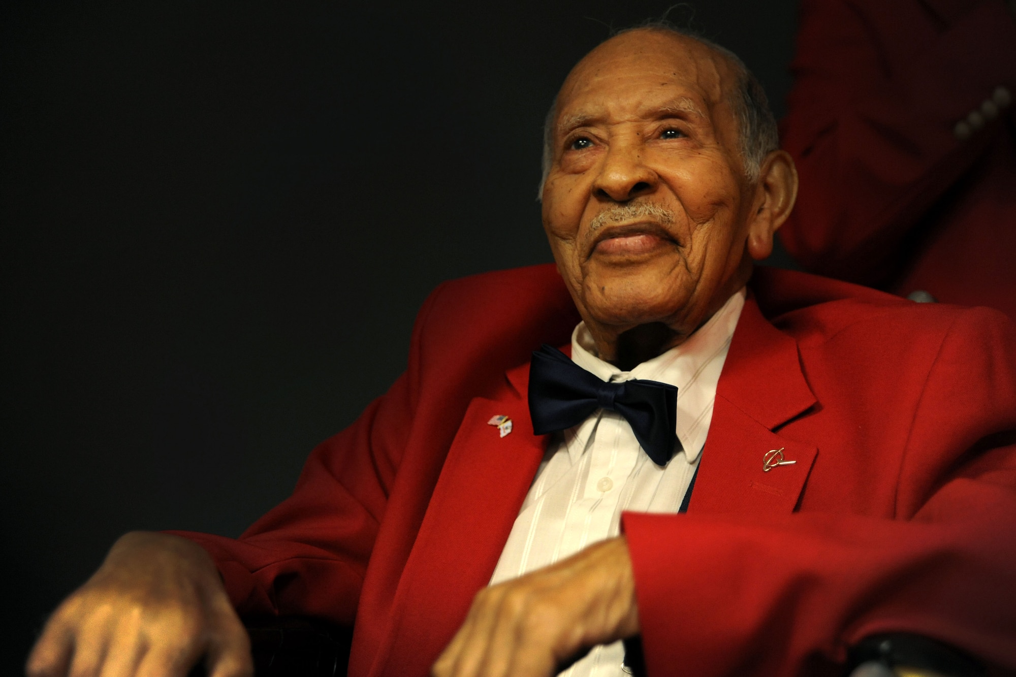 Tuskegee Airman Edward Gibson smiles for the camera at Joint Base Charleston - Air Base Feb. 16. Gibson served in the Army Air Corps as a bombardier-navigator and logged 2,300 flight hours.  (U.S. Air Force photo/Airman 1st Class Ashlee Galloway)