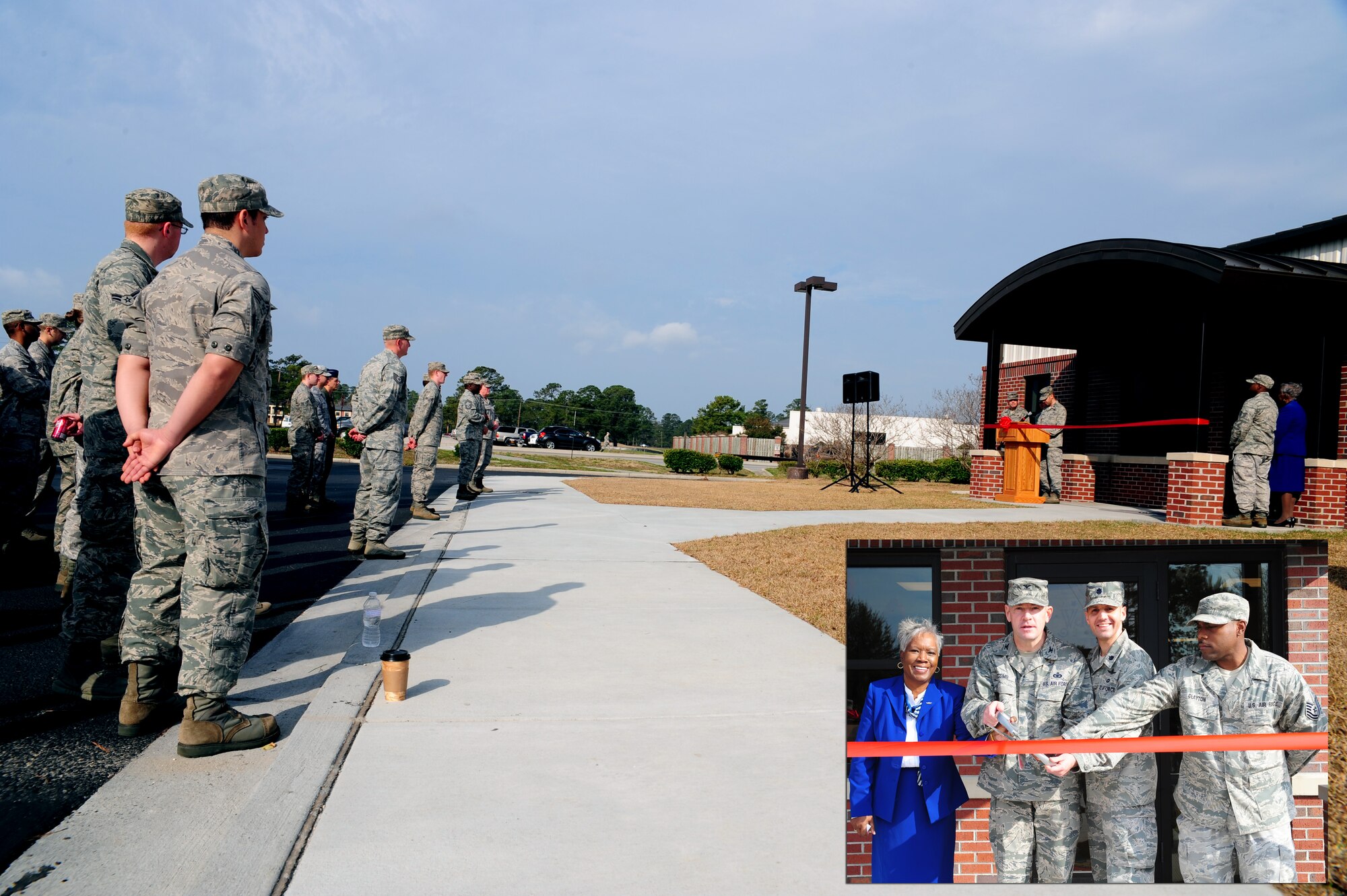 Airmen and civilians from the 628th Communication Squadron gather for the Official Mail Center and Postal Service Center ribbon cutting ceremony at Joint Base Charleston - Air Base Feb. 24. The mail center is responsible for processing all official mail on JB Charleston and the postal service center is responsible for delivering mail to the dormitories and temporary mailboxes for those on temporary duty assignments. (inset) Left to right: Nonie Page, Col. Richard McComb,  Lt. Col. David Joerres and Tech. Sgt. Marcus Clayton cut the ribbon officially opening the Official Mail Center and Postal Service Center. Page is the 628th CS knowledge operations chief, McComb is the JB Charleston commander, Joerres is the 628th CS commander and Clayton is the 628th CS official mail center non-commissioned officer in charge. (U.S. Air Force illustration/Staff Sgt. Katie Gieratz)