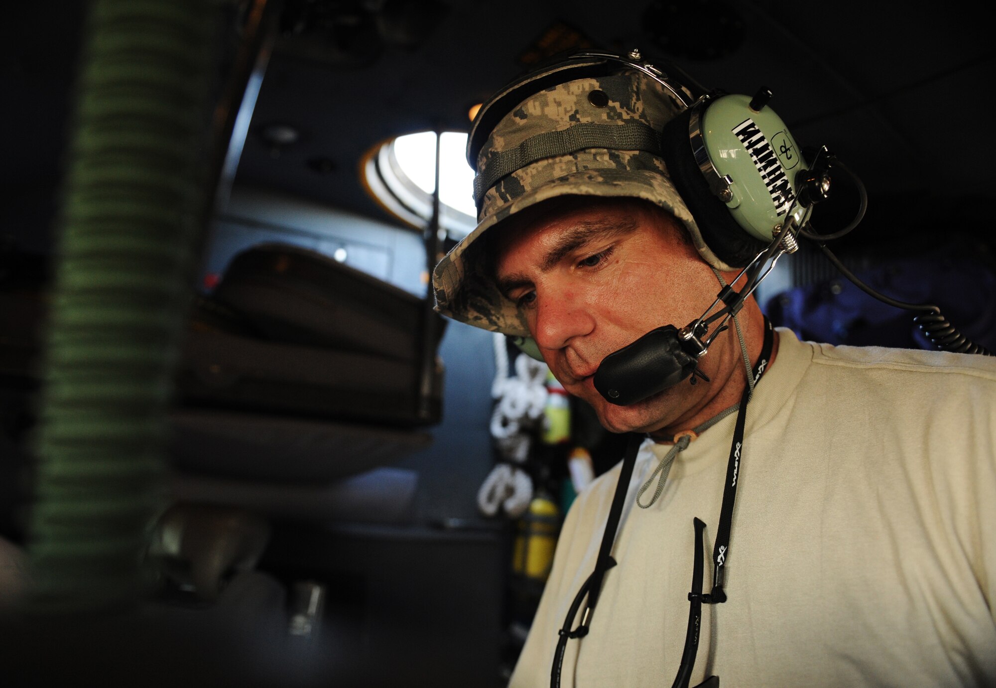 SOUTHWEST ASIA – Senior Airman Andy Schmitz, 746th Expeditionary Aircraft Maintenance Unit electrical and environmental systems specialist and native of Minneapolis, looks over an inspection document inside the cockpit of a C-130H3 Hercules during a home station check here Feb. 28, 2012. In addition to technical orders, which tells maintainers how to specifically perform maintenance on the aircraft, the inspection document specifies what items must be inspected during the home station check. (U.S. Air Force photo/Staff Sgt. Nathanael Callon)