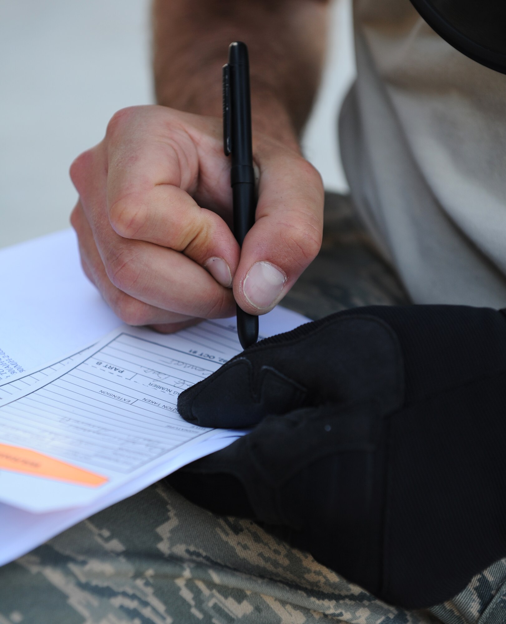 SOUTHWEST ASIA – Senior Airman Andy Schmitz, 746th Expeditionary Aircraft Maintenance Unit electrical and environmental systems specialist and native of Minneapolis, fills out warning tags after disconnecting an aircraft battery on a C-130H3 Hercules during a home station check here Feb. 28, 2012. Crew chiefs disassemble aircraft components, then specialty shops like propulsion, electrical and environmental, hydraulics, guidance and control, communication navigation, and electronic countermeasures inspect specific components to ensure the aircraft is fully functional. (U.S. Air Force photo/Staff Sgt. Nathanael Callon)