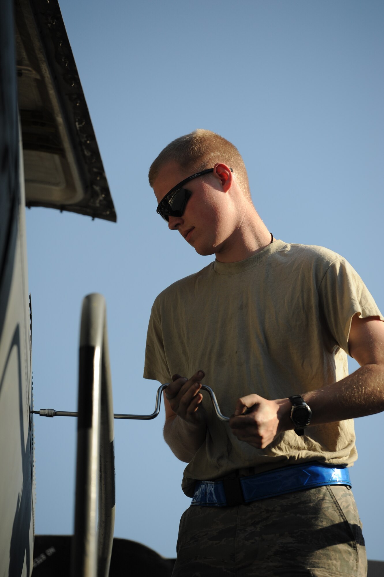 SOUTHWEST ASIA – Senior Airman Christopher Becker, 746th Expeditionary Aircraft Maintenance Unit propulsion specialist and native of Glencoe, Minn., opens panels on a C-130H3 Hercules engine to perform a function test during a home station check here Feb. 28, 2012. The 746th EAMU is deployed from Minneapolis-St. Paul Air Reserve Station, Minn. (U.S. Air Force photo/Staff Sgt. Nathanael Callon)