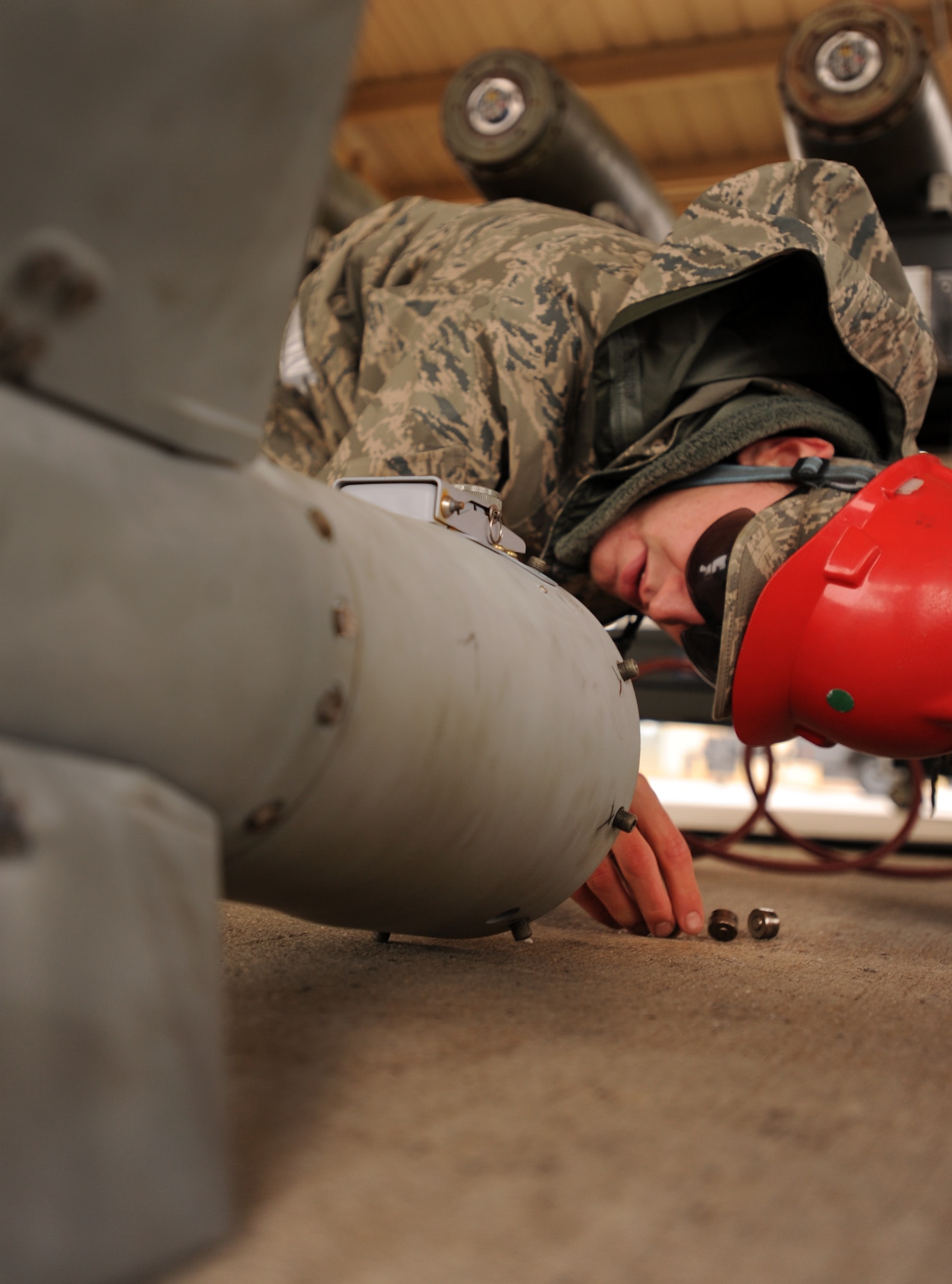 U.S. Air Force Senior Airman Nathanael Skidmore, 20th Equipment Maintenance Squadron munitions flight conventional maintenance crew, ensures the proper components are included in the fins before attaching it to the body of the inert guided bomb unit at Shaw Air Force Base, S.C., Feb. 27, 2012. The 20th EMS munitions flight built inert guided bomb units to load on to Shaw's F-16 Fighting Falcons to demonstrate warlike scenarios for an upcoming Operation Readiness Exercise. (U.S. Air Force photo by Senior Airman Tabatha McCarthy/Released)