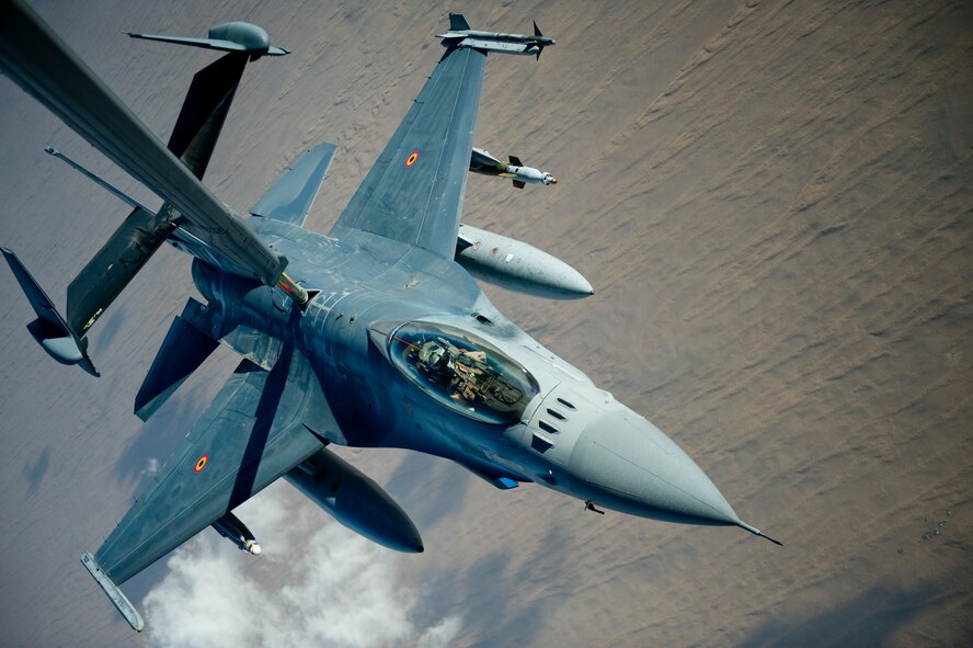 A Belgian Air Component F-16A Fighting Falcon receives fuel over Afghanistan from a KC-10 Extender from the 908th Expeditionary Air Refueling Squadron Feb. 27, 2012. The 908th EARS provides critical air refueling to aircraft in the area of responsibility, delivering more than one million gallons of fuel to the fight every day. In 2011, the 908th EARS offloaded more than 390 million pounds of fuel to more than 28,000 aircraft, flew more than 36,700 hours in almost 4,600 missions. The average sortie length for a KC-10 mission in Southwest Asia is about eight hours. (U.S. Air Force photo by Staff Sgt. Greg Biondo) 