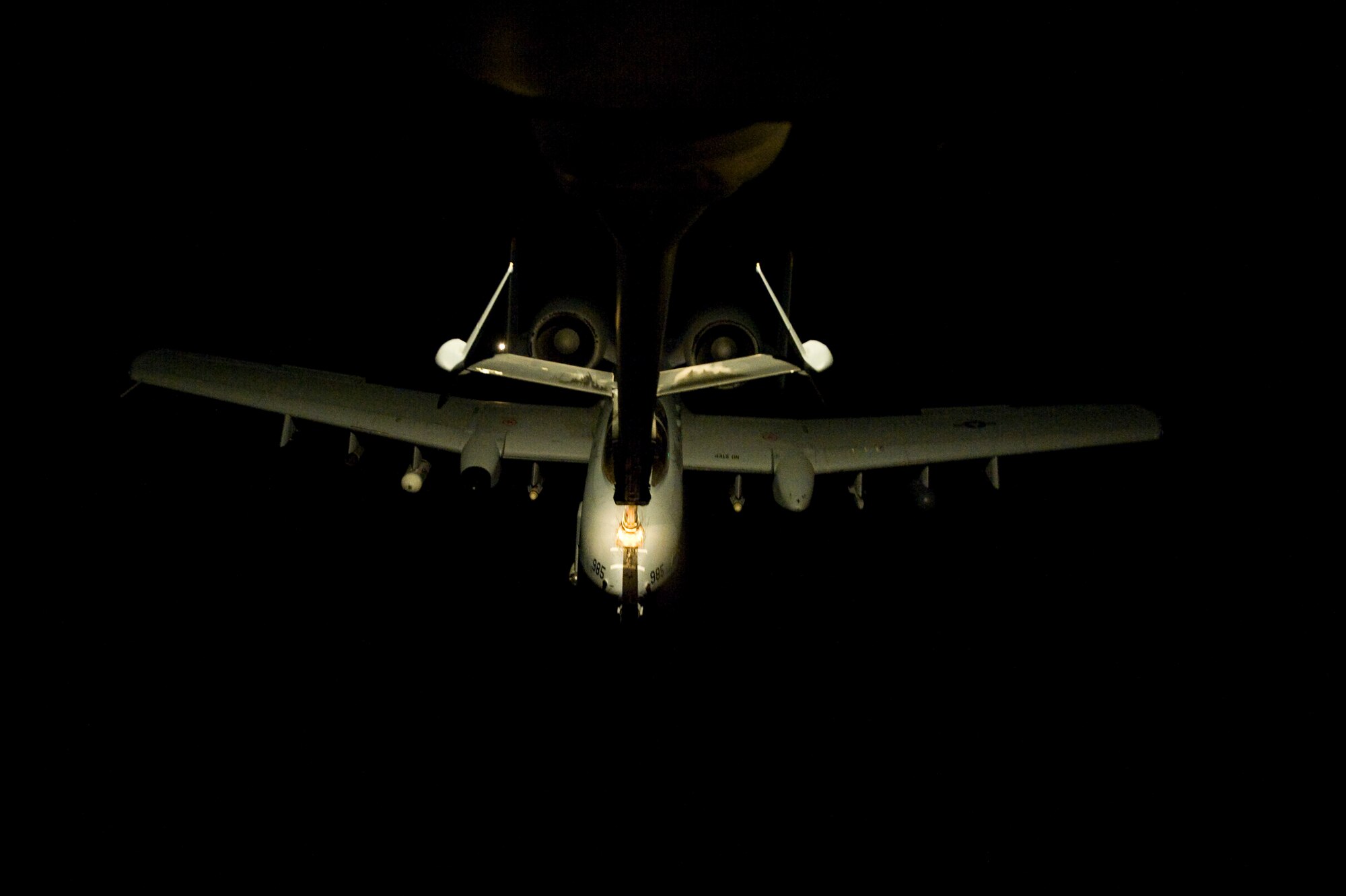 A U.S. Air Force A-10 Thunderbolt II receives fuel over Afghanistan from a KC-10 Extender from the 908th Expeditionary Air Refueling Squadron, Feb. 24, 2012. The 908th EARS provides critical air refueling to aircraft in the area of responsibility, delivering more than one million gallons of fuel to the fight every day. In 2011, the 908th EARS offloaded more than 390 million pounds of fuel to more than 28,000 aircraft, and flew more than 36,700 hours in almost 4,600 missions. The average sortie length for a KC-10 mission in Southwest Asia is about eight hours. (U.S. Air Force photo by Staff Sgt. Greg C. Biondo)