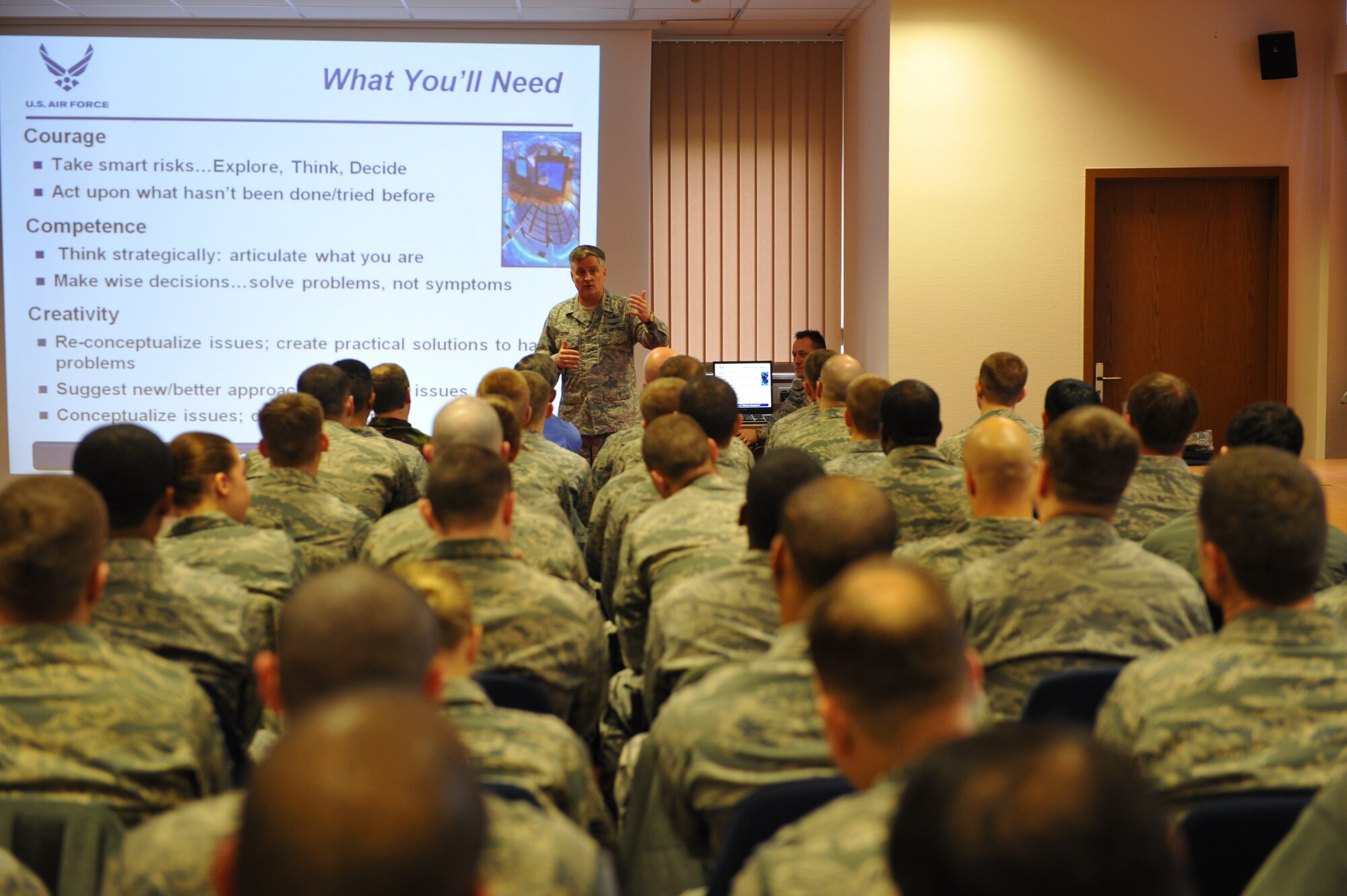 SPANGDAHLEM AIR BASE, Germany – Lt. Gen. William Lord, Air Force chief of warfighting integration and chief information officer, speaks to Airmen inside the Eifel Conference Center here Feb. 27 during his visit. Lord visited Spangdahlem AB to speak to Airmen about advances in communications and cyberspace technology and how the changes will affect nearly all career fields and to tour the base.  (U.S. Air Force photo by Airman 1st Class Dillon Davis/Released)