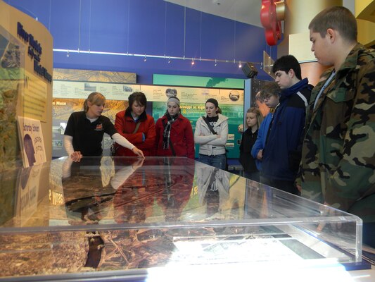 ALTON, Ill. — Ashely Cox, river engineer with the U.S. Army Corps of Engineers St. Louis District, talks with STEM students about how the Corps of Engineers uses Hydraulic Sediment Response modeling to address various problems on the river at the National Great Rivers Museum here, during the Saturday Scholars program at Melvin Price Locks and Dam Feb. 25, 2012. 