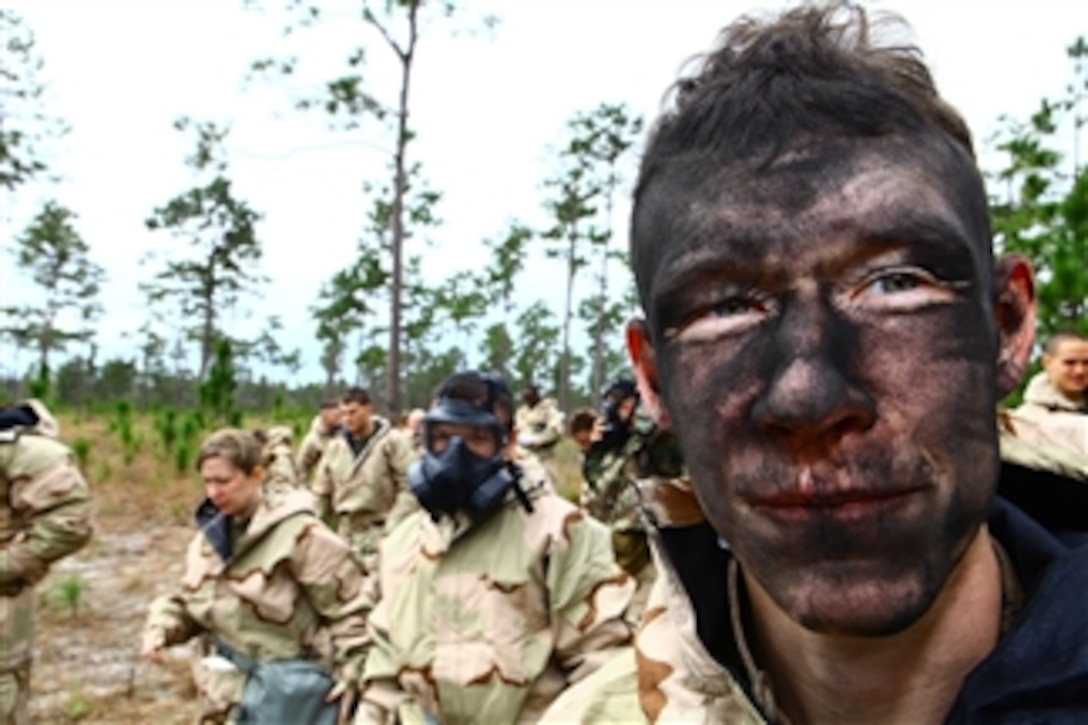 U.S. Marine Corps Cpl. Bart Steinburg, a data system specialist assigned to the 24th Marine Expeditionary Unit, has his face covered with M291 decontamination powder during chemical, biological, radiological and nuclear defense training at Camp Lejeune, N.C., on Feb. 27, 2012.  
