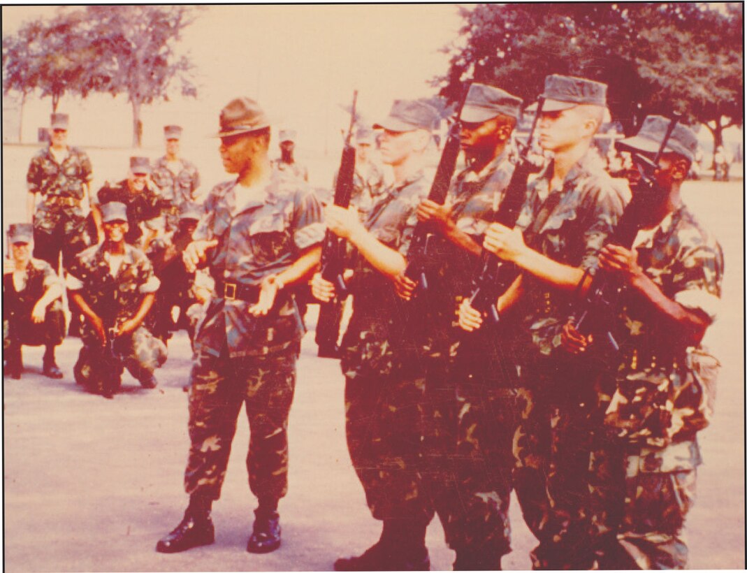 Then, senior drill instructor Gunnery Sgt. Frank Marlowe, addresses  his platoon during a training exercise.