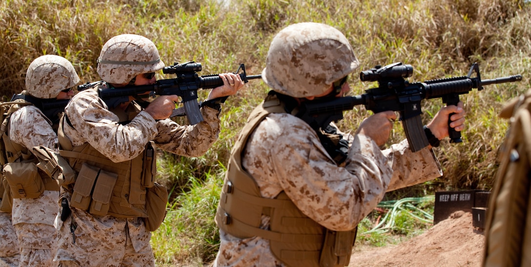 PUULOA RIFLE RANGE, Hawaii -Marines with U.S. Marine Corps Forces, Pacific, conduct Table 3 Intermediate Combat Rifle Marksmanship Training with the M4 Carbine assault rifle May 5 here. MarForPac Marines began Table 3 qualifications in January as part of a Corps-wide effort to provide Marines additional weapons training. The majority of Marines qualify annually on the Table 1, known distance, and Table 2, field fire, courses of fire.