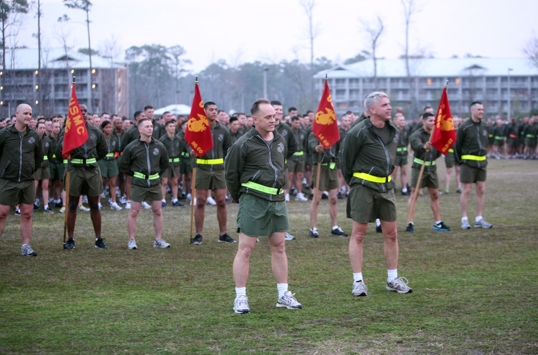 Marines and sailors of Combat Logistics Regiment 27, 2nd Marine Logistics Group stand in formation while listening to Maj. Gen. Michael G. Dana, the 2nd MLG commanding general, after a motivational run aboard Camp Lejeune, N.C., Feb. 24, 2012. Dana thanked the Marines and sailors for a job well-done over the past year. 