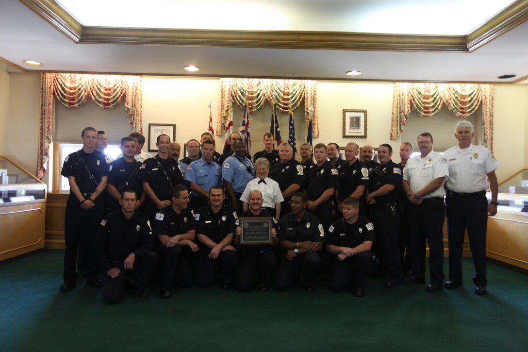 Members of the base’s Fire and Emergency Services Division, Department of Public Safety pose for a quick snapshot after they were named the recipient of the Large Fire Department of the Year for the Marine Corps. The award is given out yearly to the best large fire department in the Marine Corps.