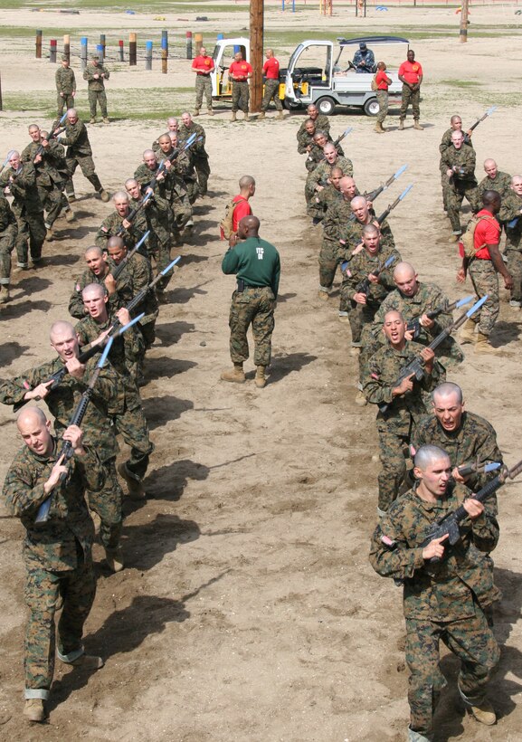 A Marine Corps Martial Arts Program instructor conducts a bayonet technique class for Company B., 1st Recruit Training Battalion, as part of the Feb. 29 aboard Marine Corps Recruit Depot San Diego. Co. B recruits are in the second week of recruit training.