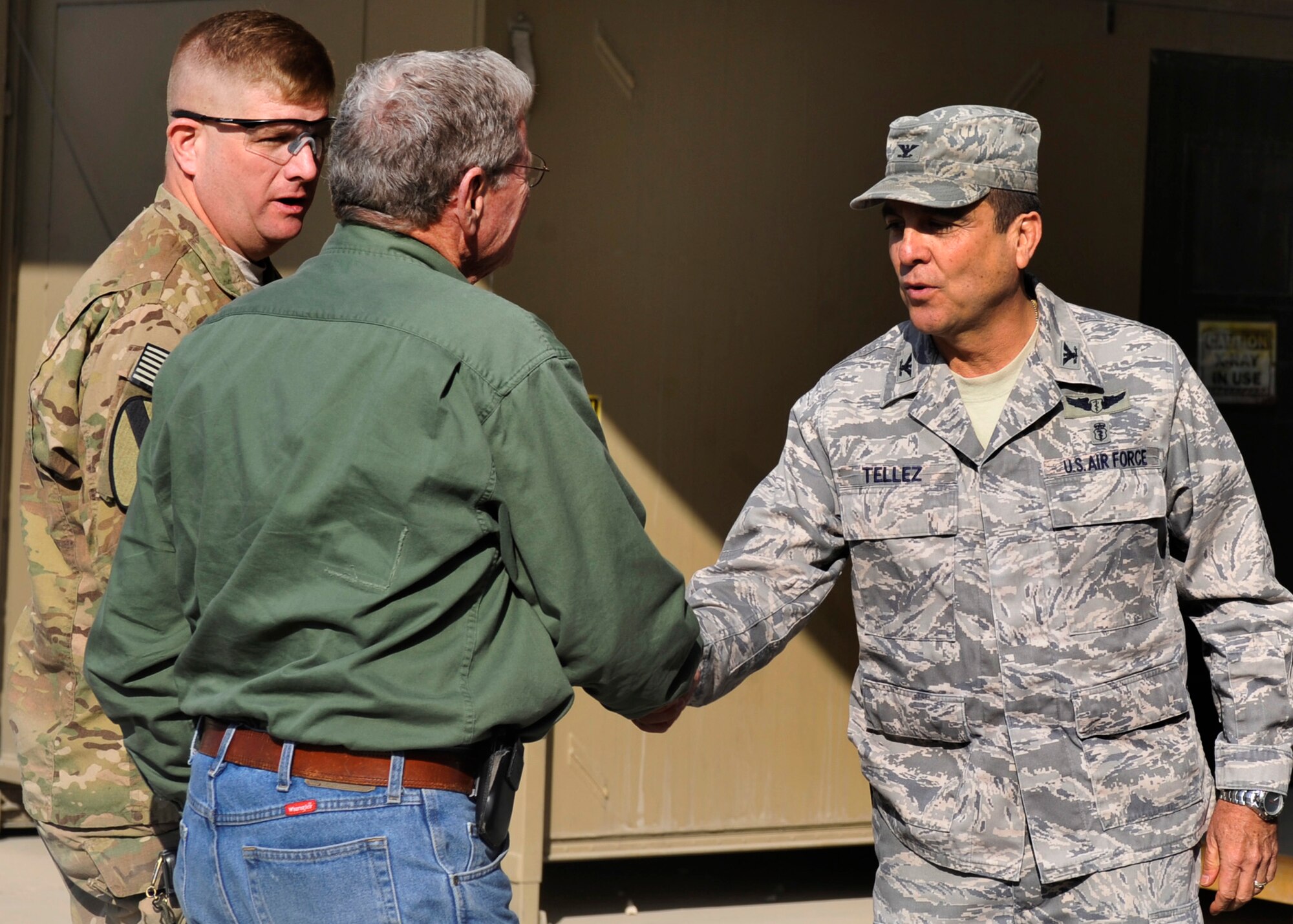 BAGRAM AIRFIELD, Afghanistan— James Inhofe, senator of Oklahoma, greets Col. Guillermo Tellez, 455 Expeditionary Medical Support Squadron commander, outside the Craig Joint Theater Hospital at Bagram Airfield Afghanistan, Jan 1, 2012. The senator spent time at the hospital to boost morale among the wounded. (U.S. Air Force photo/ Airman 1st Class Ericka Engblom)


