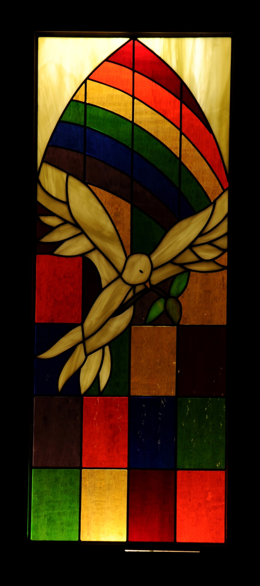 SOUTHWEST ASIA - One of four stained glass windows sits in the 380th Air Expeditionary Wing Chapel after being transferred from Sather Air Base, Iraq Nov. 11, 2011. They were originally created in Tucson, Ariz. in 2008 by Roger and Pam Davidson, parents of retired Master Sgt. Brian Davidson. (U.S. Air Force photo/Tech. Sgt. Arian Nead)