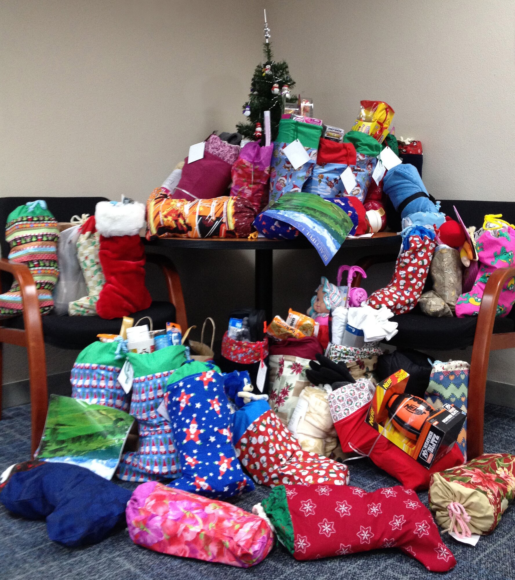 Some of the 75 Christmas Stockings that were filled by members of the 142nd Fighter Wing members and were donated to needy families in the Portland area during the holiday season. (photo provided by the 142nd Fighter Wing Family Programs)
