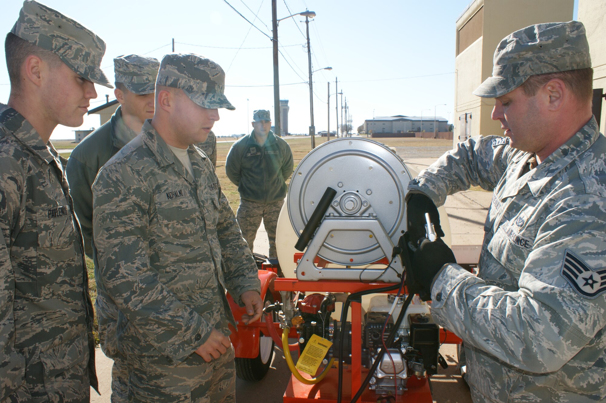 Airmen conduct equipment inspections during field training at the 366th Training Squadron's  Pest Management Apprentice Course Dec 16, 2011 at Sheppard Air Force Base, Texas.  Students learn pest management missions for both home station and the contingency environment during the 33 academic days and six major blocks of instruction. (U.S. Air Force photo/Dan Hawkins)