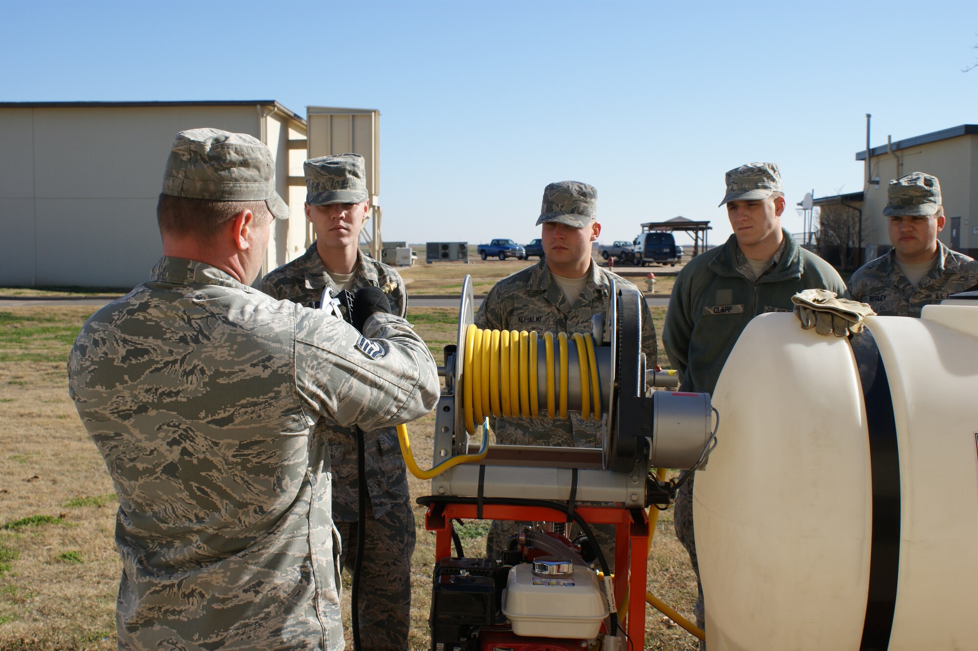 Airmen learn pesticide distribution techniques during field training the 366th Training Squadron's  Pest Management Apprentice Course Dec 16, 2011 at Sheppard Air Force Base, Texas.  Students learn pest management missions for both home station and the contingency environment during the 33 academic days and six major blocks of instruction. (U.S. Air Force photo/Dan Hawkins)