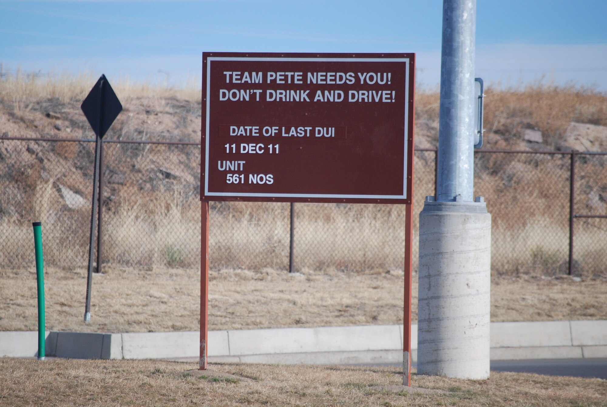 The driving under the influence signs became effective shortly before Thanksgiving. Once a DUI has been confirmed, the squadron contacts the 21st Civil Engineer Squadron to have the magnetic signs made. If the base goes for several months without having a DUI, the name of the last squadron with a DUI will be taken off the sign. (U.S. Air Force photo/Lea Johnson)