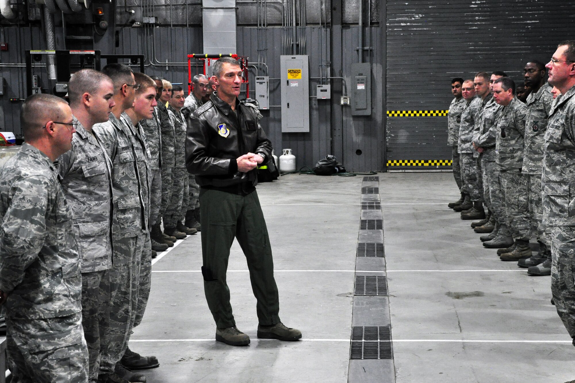 Col. Patrick McKenzie, 51st Fighter Wing commander, addresses Airmen from the 51st Civil Engineer Squadron during a commander’s call Jan. 3, 2012. He took time to recognize five Airmen who went above and beyond during a response to an on-base bus crash. (U.S. Air Force photo/Tech. Sgt. Chad Thompson)