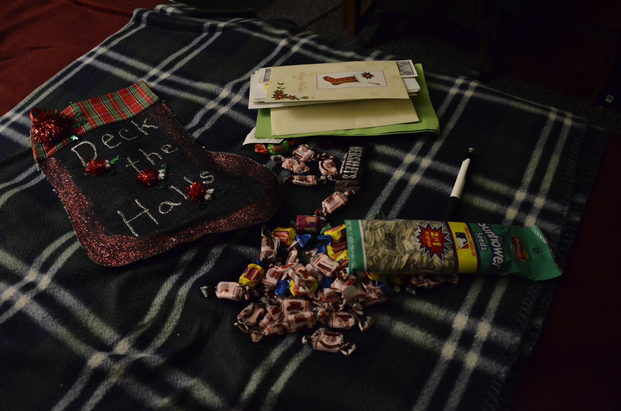 Stockings full of anything from games, to candy and to, in some cases, the necessities of life were delivered to the dorm rooms of Wolf Pack servicemembers at Kunsan Air Base, Republic of Korea, Dec. 24, 2011. (U.S. Air Force photo by Senior Airman Benjamin Stratton/Released)