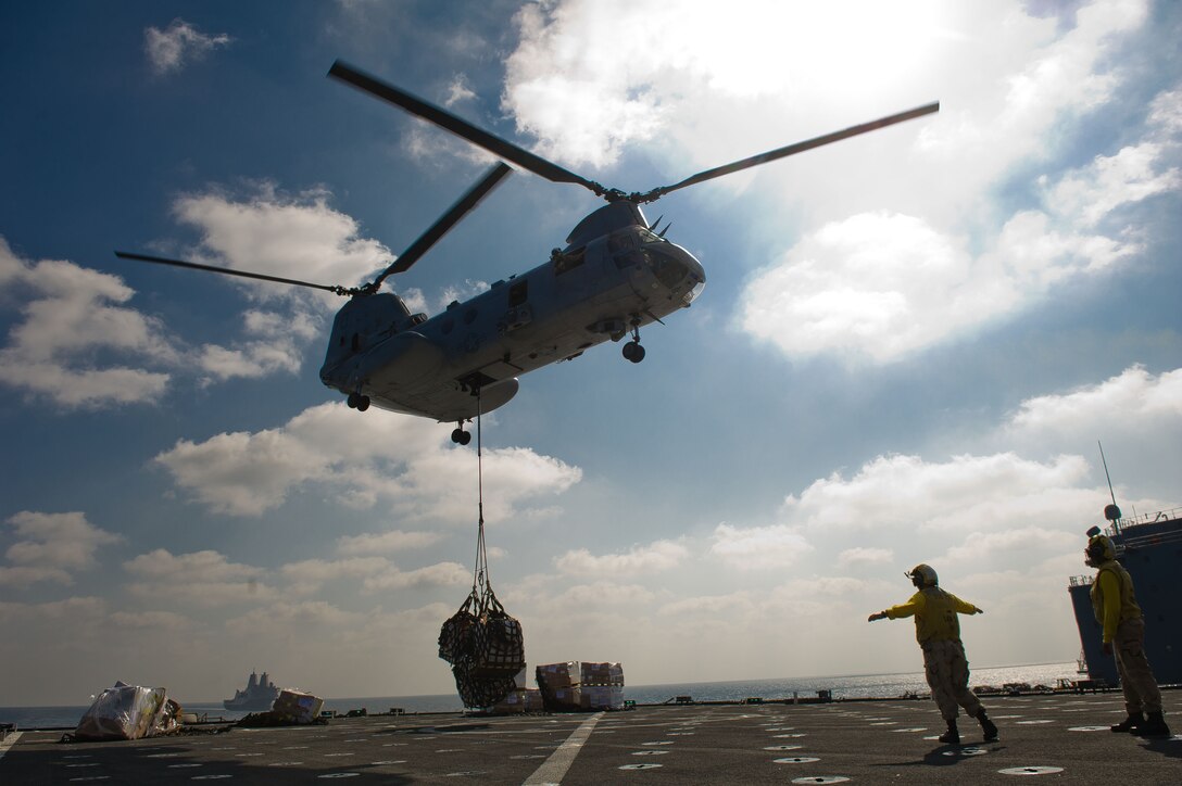 A CH-46E Sea Knight with Marine Medium Helicopter Squadron 268 (Reinforced) transfers cargo from USNS Patuxent (T-AO 200) to USS Pearl Harbor (LSD 52) Jan. 4.  The squadron is the aviation combat element for the 11th Marine Expeditionary Unit (MEU).  The 11th MEU is currently deployed as part of the Makin Island Amphibious Ready Group (MKIARG) as the U.S. Central Command theater reserve force, also providing support for maritime security operations and theater security cooperation efforts in the U.S. 5th Fleet area of responsibility.