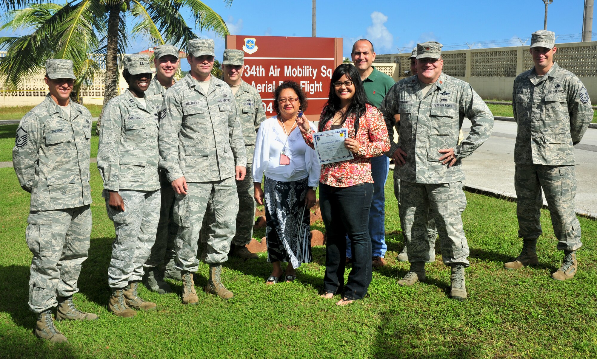 ANDERSEN AIR FORCE BASE, Guam—Yolonda Flores, Aerial Port Flight secretary, was awarded Team Andersen’s Best, Dec. 29. Andersen’s Best is a recognition program which highlights a top performer from the 36th Wing. Each week, supervisors nominate a member of their team for outstanding performance and the wing commander presents the selected Airman/Civilian with an award. (U.S. Air Force photo by Senior Airman Benjamin Wiseman/Released)