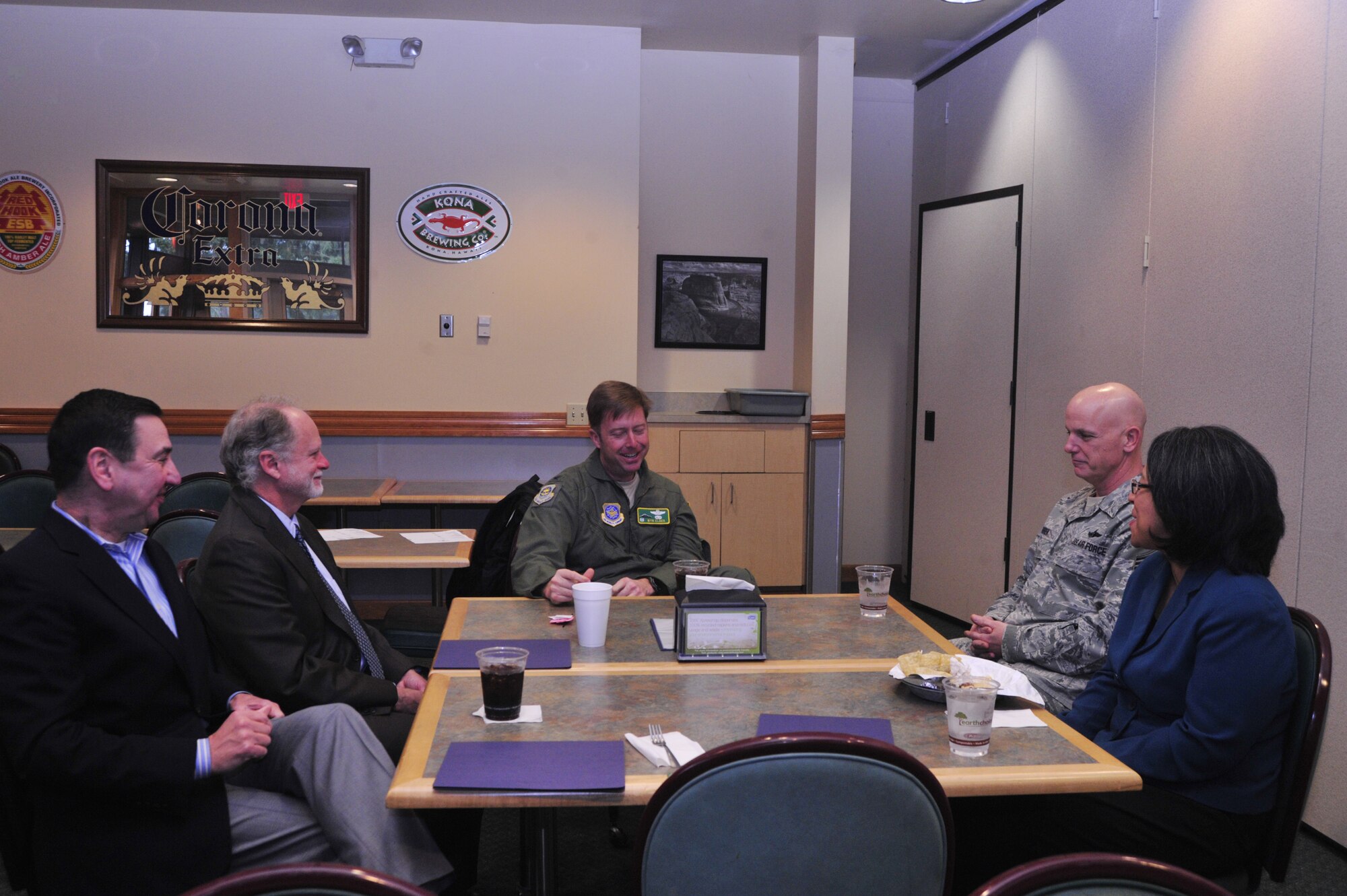 Col. Wyn Elder, 62nd Airlift Wing commander (center), and Chief Master Sgt. Greg Warren, 62nd AW command chief, enjoys lunch with (from left to right) Mayor Doug Richardson, City of Lakewood, Mayor Stephen Buxbaum, City of Olympia, and Mayor Marilyn Strickland, City of Tacoma, Jan. 5, 2011, at Joint Base Lewis-McChord, Wash. The group discussed upcoming 62nd AW events and community topics. (U.S. Air Force photo/Staff Sgt. Frances Kriss)