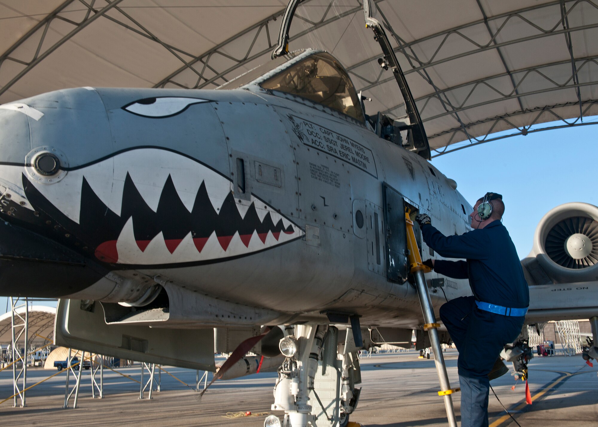 U.S. Air Force Senior Airman Eric Mastin, 23rd Aircraft Maintenance Squadron, climbs an A-10C Thunderbolt II to conduct pre-flight checks prior to a pilot upgrade training session at Moody Air Force Base, Ga., Jan. 5, 2011. Pre-flight inspections are vital to the safety of pilots and maintainers of aircraft. The ability to conduct these inspections and other mission-related tasks will soon be challenged during an upcoming operational readiness inspection being held March 28 to April 4. (U.S. Air Force photo by Senior Airman Eileen Meier/Released)