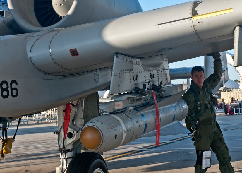 U.S. Air Force Capt. Brandon Liabenow, 74th Fighter Squadron, conducts a pre-flight inspection on an A-10C Thunderbolt II prior to a pilot upgrade training session at Moody Air Force Base, Ga., Jan. 5, 2011. Since the holiday break ended, the 23rd Aircraft Maintenance Squadron and 74th FS are back in game-mode preparing for next week’s operational readiness exercise and an operational readiness inspection being held March 28 to April 4. (U.S. Air Force photo by Senior Airman Eileen Meier/Released)
