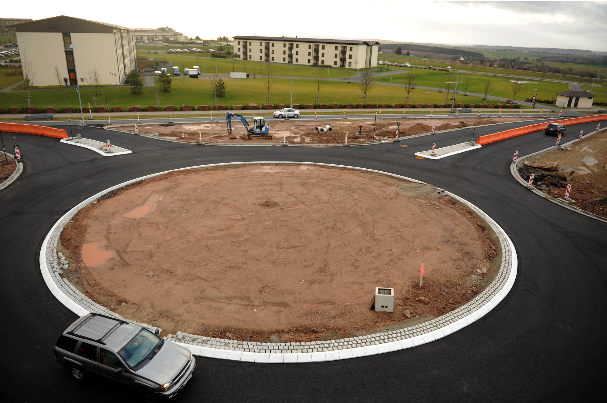 SPANGDAHLEM AIR BASE, Germany – The new traffic circle into the northwest expansion area is now open. Inbound traffic from the main gate must yield to outbound traffic from the traffic circle. There has also been a change to the traffic flow into the Shoppette and gas-pump lanes. Saber Airrmen are advised to look for yield and traffic signs as they enter this area. The entire roadway and circle will be temporarily closed during spring to allow workers to apply a top layer of asphalt. (U.S. Air Force photo/Airman 1st Class Matthew B. Fredericks)