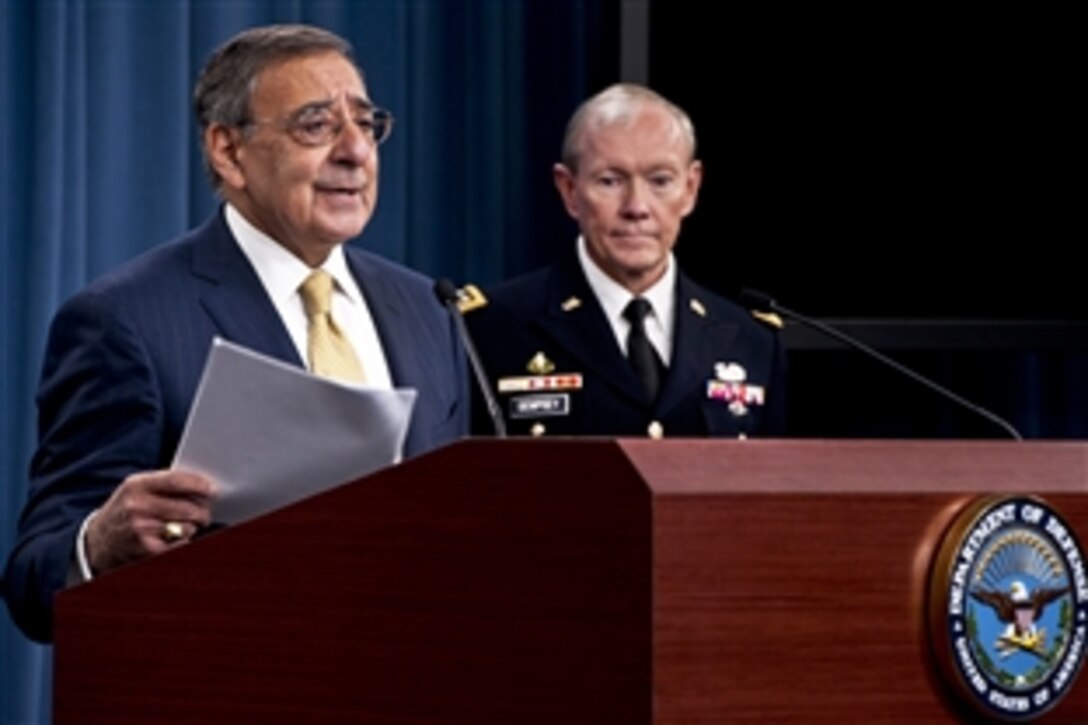 Defense Secretary Leon E. Panetta briefs the press on defense strategy as Army Gen. Martin E. Dempsey, chairman of the Joint Chiefs of Staff, looks on at the Pentagon, Jan. 5, 2012. Panetta gave his remarks after President Barack Obama announced the defense strategy for the Defense Department going forward.