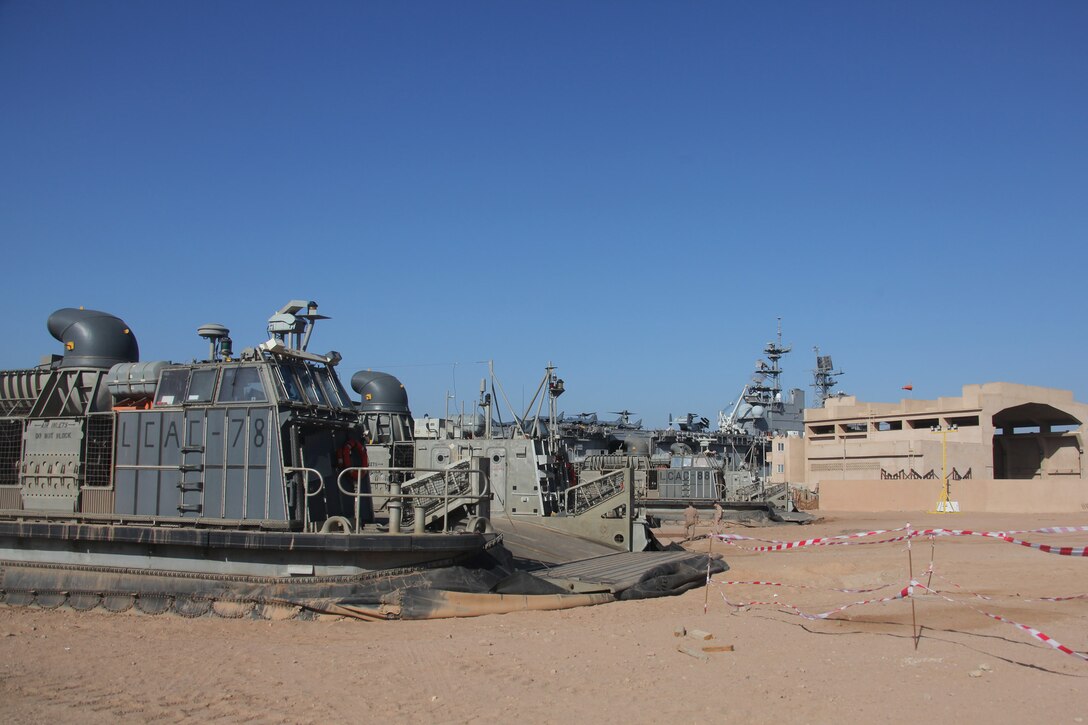 A Landing craft, air cushioned vehicle with 22nd Marine Expeditionary Unit (MEU), sits on the beach during amphibious assault ship USS Bataan’s (LHD-5) wash down, Jan. 5, 2011 Agricultural wash-downs are performed to protect U.S. agricultural and natural resources by preventing the entry of foreign animal and plant pests and noxious weeds. The 22nd MEU is currently deployed as part of the Bataan Amphibious Ready Group (BATARG) as the U.S. Central Command theatre reserve force, also providing support for maritime security operations and theater security cooperation efforts in the U.S. 5th Fleet area of responsibility.