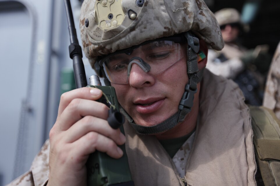 Reconnaissance Marine Sgt. Richard Eldemire calls in a CH-46E Sea Knight with Marine Medium Helicopter Squadron 268 (Reinforced) aboard USS Makin Island (LHD 8) Jan. 5 during a casualty-evacuation drill. Eldemire, 31, hails from Kingston, Jamaica and serves as an assistant team leader with the 11th Marine Expeditionary Unit's Battalion Landing Team 3/1. The unit is currently deployed aboard the amphibious assault ship as part of the Makin Island Amphibious Ready Group (MKIARG), which is a U.S. Central Command theater reserve force. The group is also providing support for maritime security operations and theater security cooperation efforts in the U.S. 5th Fleet area of responsibility.