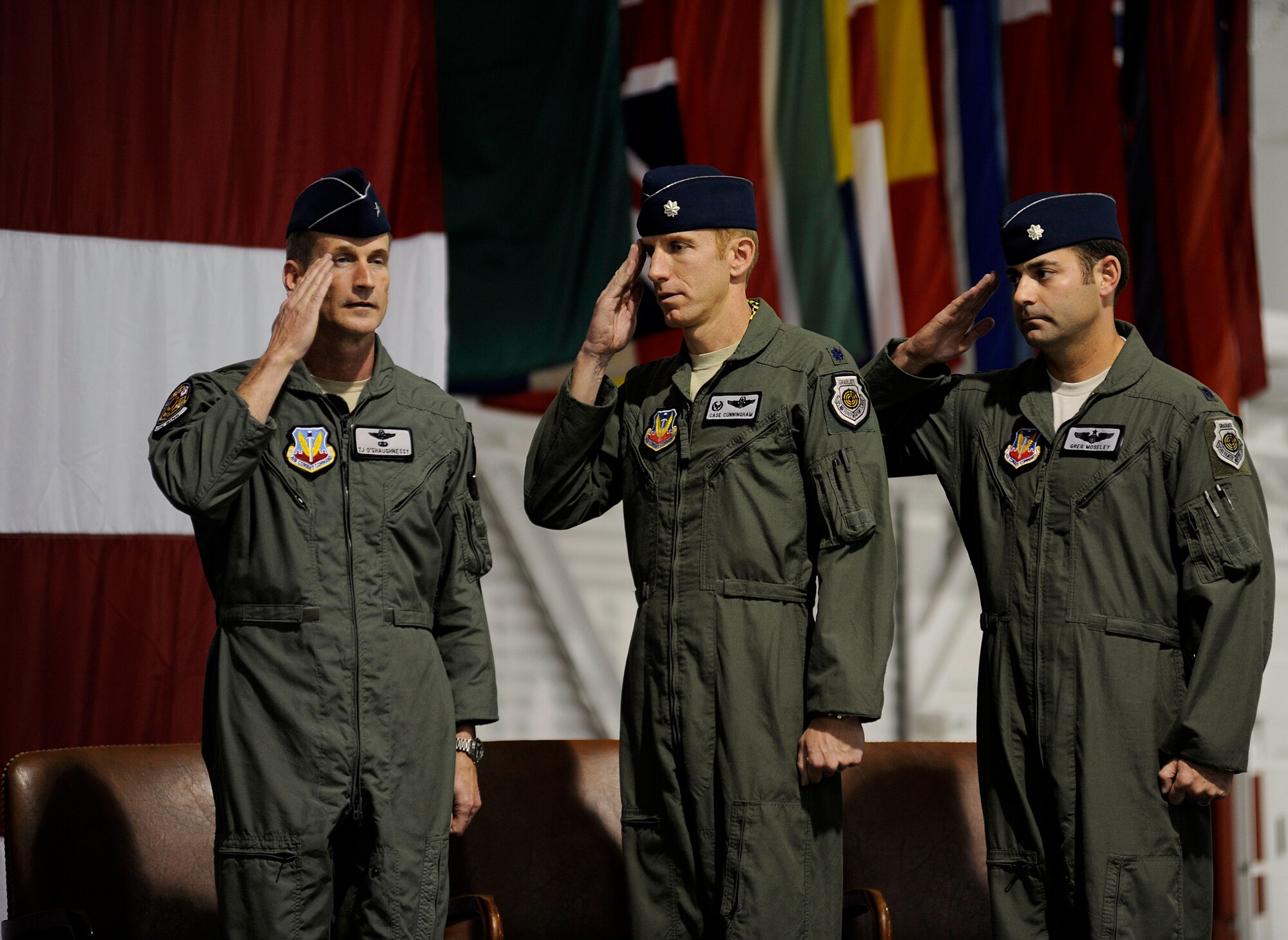 Lt. Col. Case Cunningham (middle), Commander, U.S. Air Force Air Demonstration Squadron "Thunderbirds" and Lt. Col. Gregory Moseley (far right) renders a salute to Brig. Gen. Terrence J. O'Shaughnessy, 57th Wing Commander, during the change of command ceremony, Jan. 6, 2012. Lt. Col. Cunningham relinquishes command to Lt. Col. Moseley.
(U.S. Air Force photo/Staff Sgt. Larry E. Reid Jr., Released)