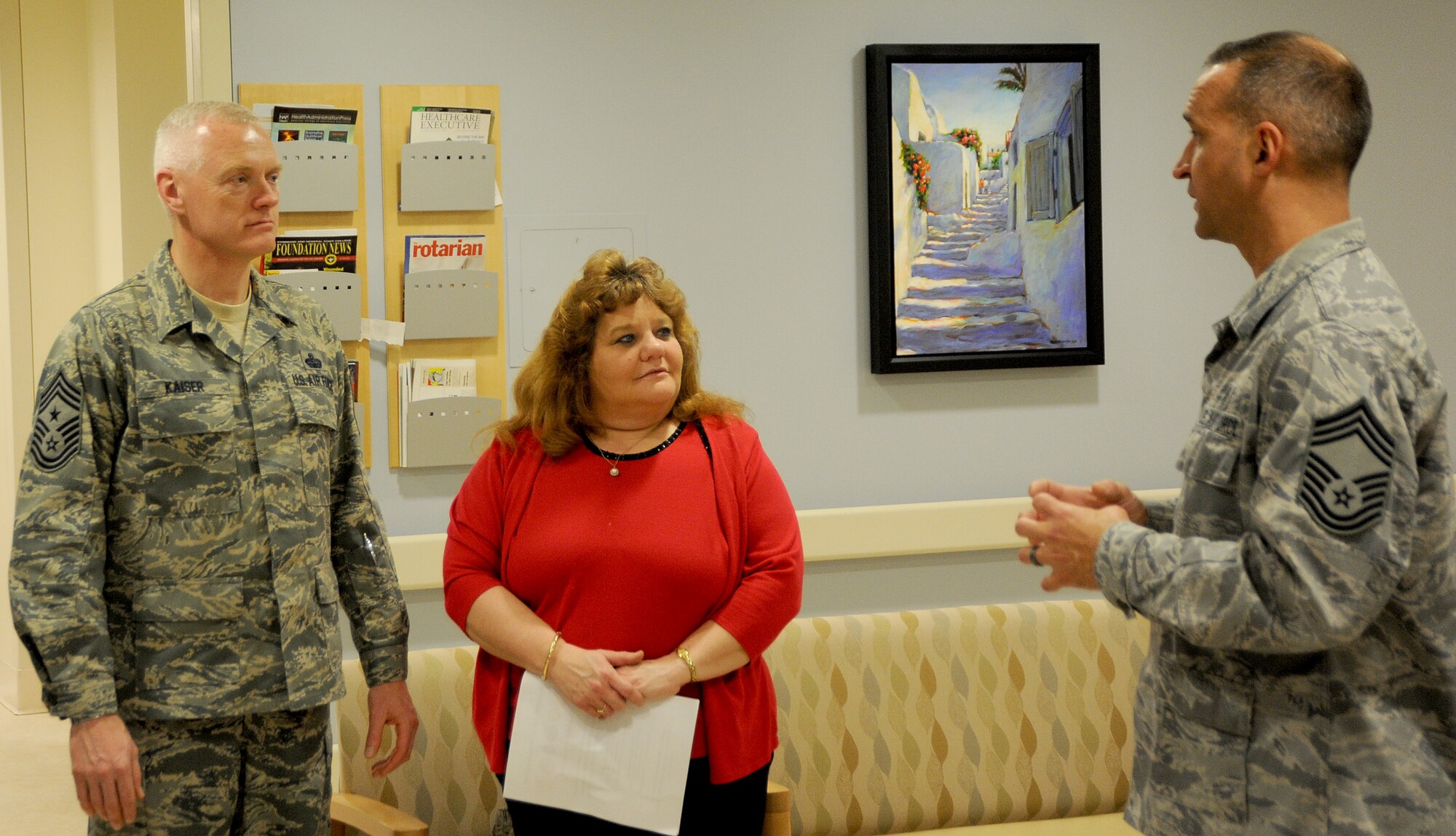 Chief Master Sgt. Richard Kaiser, Air Mobility Command command chief, and Mrs. Kaiser, speak to Chief Master Sgt. Curtis Kinnick, 375th Medical Operation Squadron, during a Medical Group tour Jan. 6, 2012 at Scott Air Force Base, Ill.  Kaiser visited different facilities around Scott during his two day visit. (U.S. Air Force photo/ Airman 1st Class Divine Cox) 