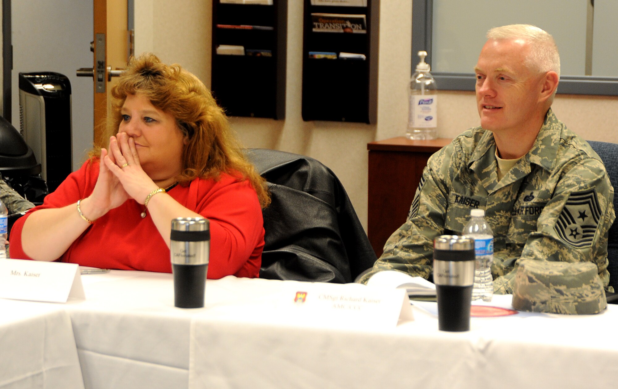 Chief Master Sgt. Richard Kaiser, Air Mobility Command command chief, and Mrs. Kaiser speak to Airmen during a resilience briefing Jan. 6, 2012 at Scott Air Force Base, Ill.  Kaiser recieved feedback from the Airmen on how resiliency training impacted their lives. (U.S. Air Force photo/ Airman 1st Class Divine Cox) 