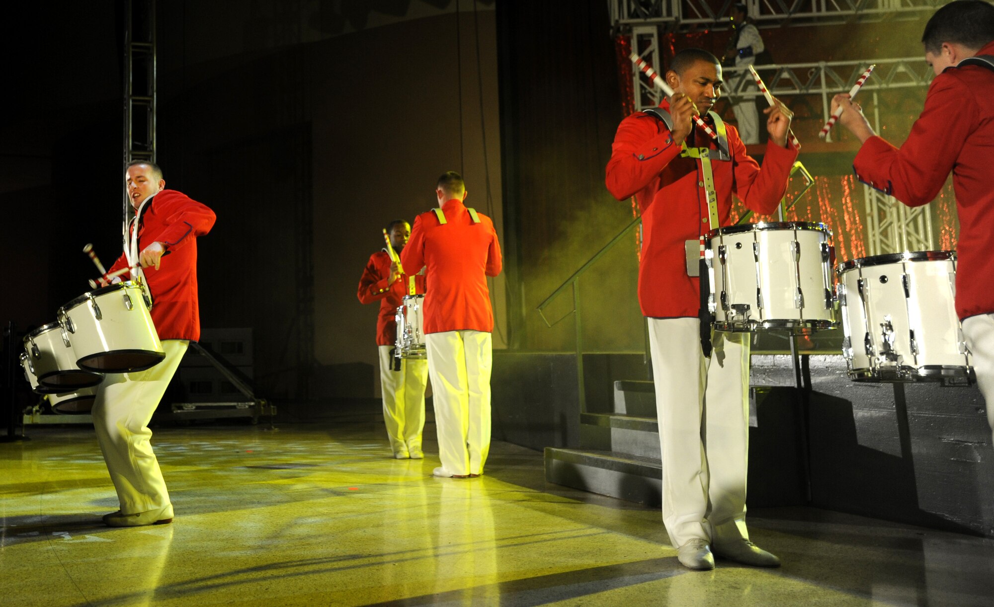 Tech. Sergeant Doug Boren, left, performs on the quad drums during the opening number of Tops in Blue’s performance at Century II Performing Arts and Convention Center Jan. 4, 2012, Wichita, Kan. Boren, a 384th Air Refueling Squadron boom operator instructor, has been touring worldwide with Tops in Blue for the past year. (U.S. Air Force photo/ Airman 1st Class Laura L. Valentine)