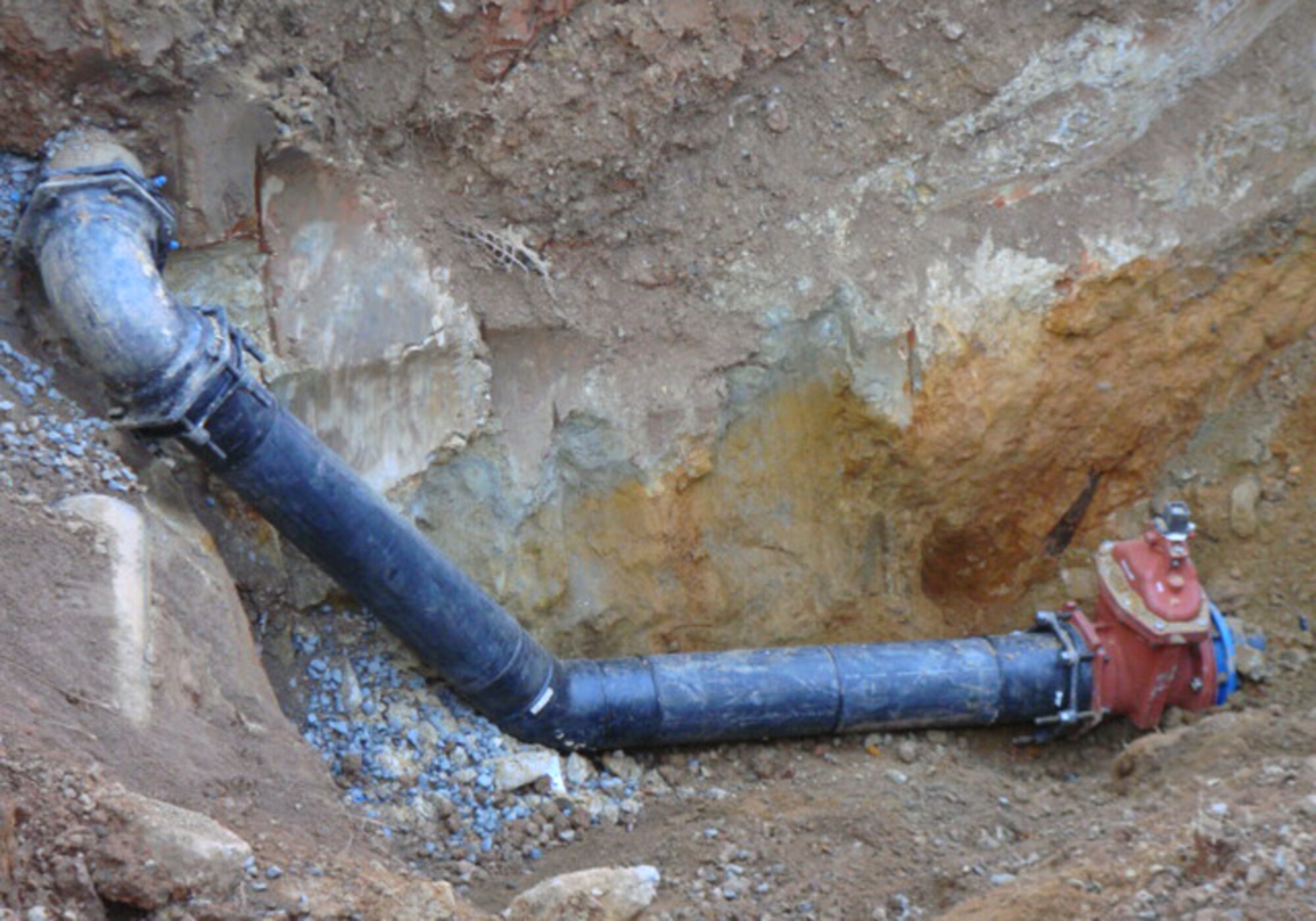 Existing base waterlines are replaced with pipelines made with a durable and thick plastic called High Density Polyethylene, or HDPE. One of the advantages of HDPE piping is the joints may be fusion welded, similar to the welding of steel. This results in a much stronger and durable joint than the solvent welds used on PVC piping, which the civil engineers have had difficulties with in the past. (Courtesy photo)