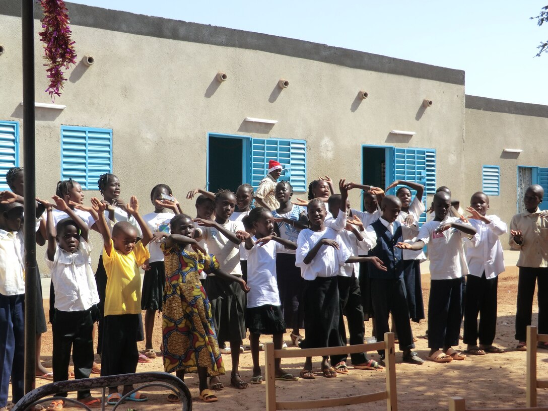 Kaya, Burkina Faso school children perform traditional dances during a special holiday celebration. Two AFOSI agents had the pleasure of observing the special dances. Burkino Faso is located in Western Africa. (U.S. Air Force Photo)