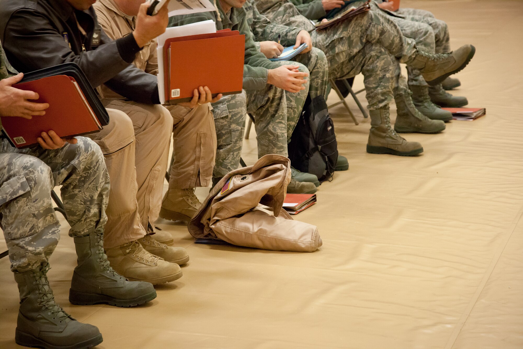Airmen wait in line for their final checklist and to be dismissed from the deployment processing line.  Members of the 934th Airlift Wing processed through all of their paperwork today to prepare for their upcoming deployment to Southwest Asia.  (Air Force Photo/Shannon McKay)