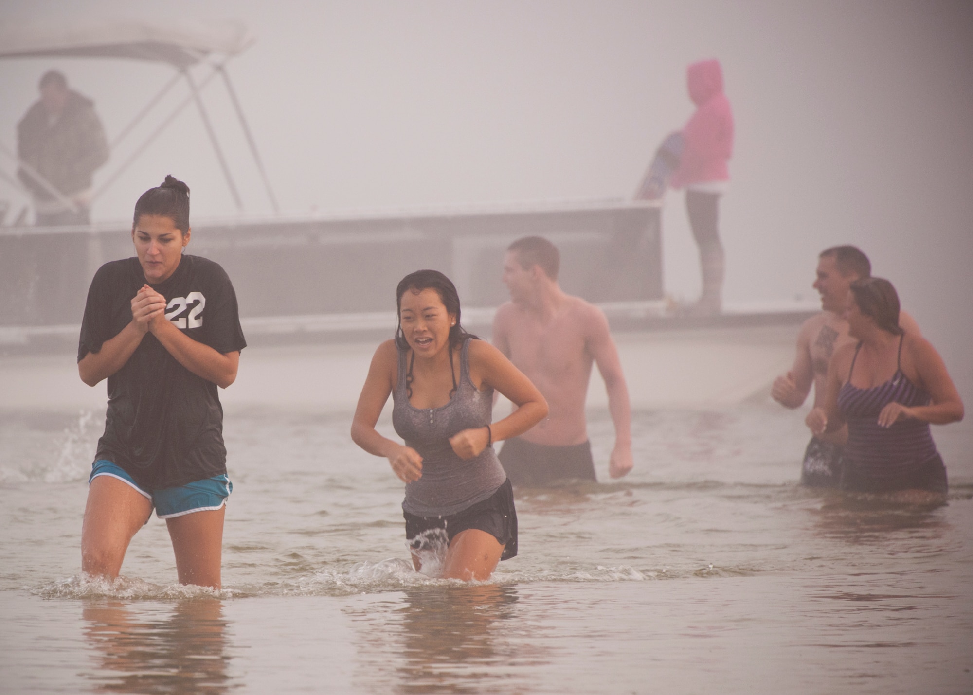 Almost 30 people braved the 45 degree morning temperatures, fog and even colder waters of the Choctawhatchee Bay during Eglin’s second annual Polar Bear swim, held at Post’l Point, Jan. 6.  (U.S. Air Force photo/Samuel King Jr.)