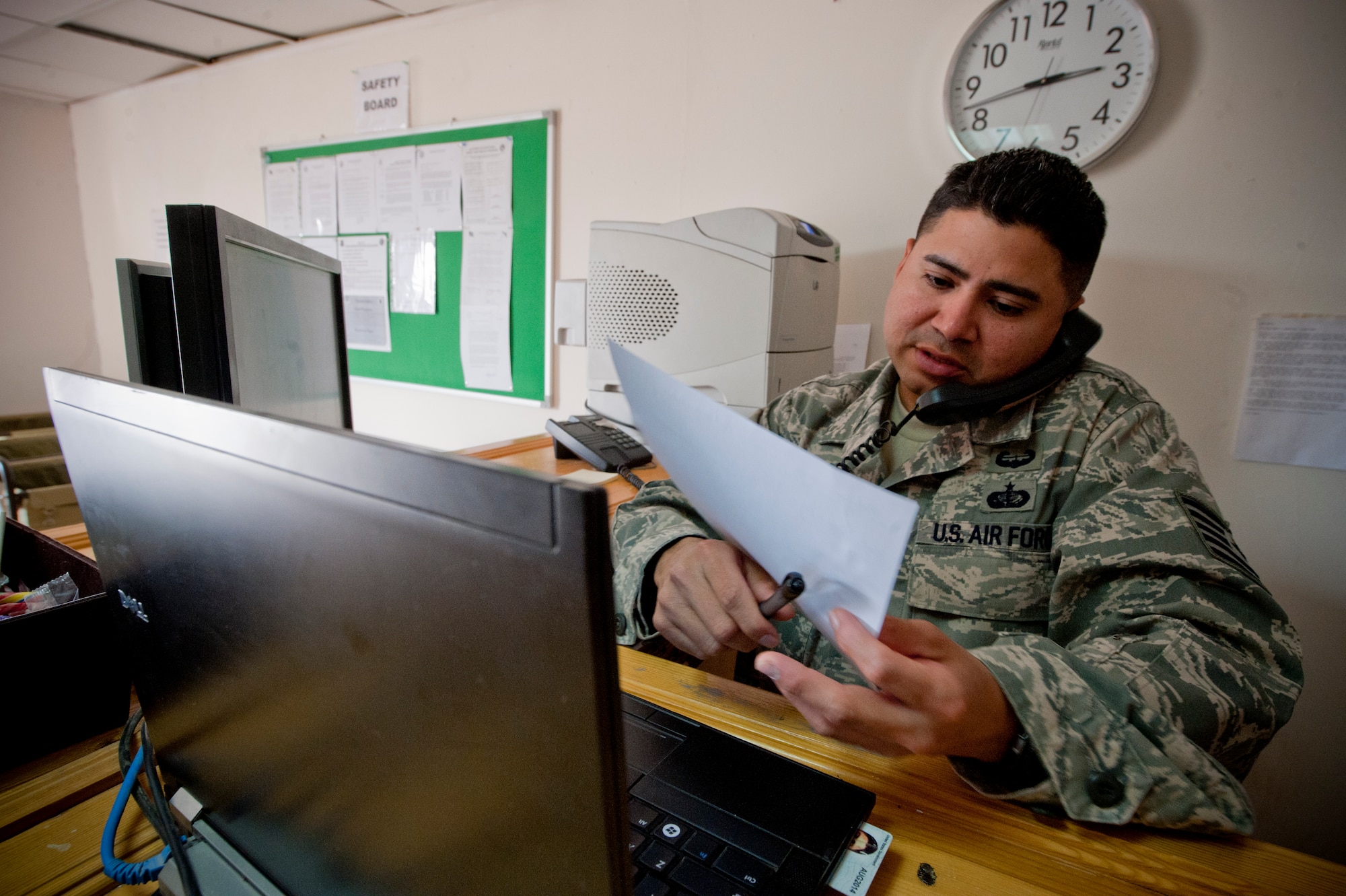 Tech. Sgt. Jorge W. Garcia, 332nd Expeditionary Force Support Squadron lodging flight, sets up a room reservation for inbound personnel, Jan. 6, 2012 at an undisclosed location in Southwest Asia. The lodging flight has processed all in-bound and out-bound personnel for the 332nd Air Expeditionary Wing. Garcia is deployed from McGuire Air Force Base, N.J. (U.S. Air Force Photo by Staff Sgt. Joshua J. Garcia/ Released)