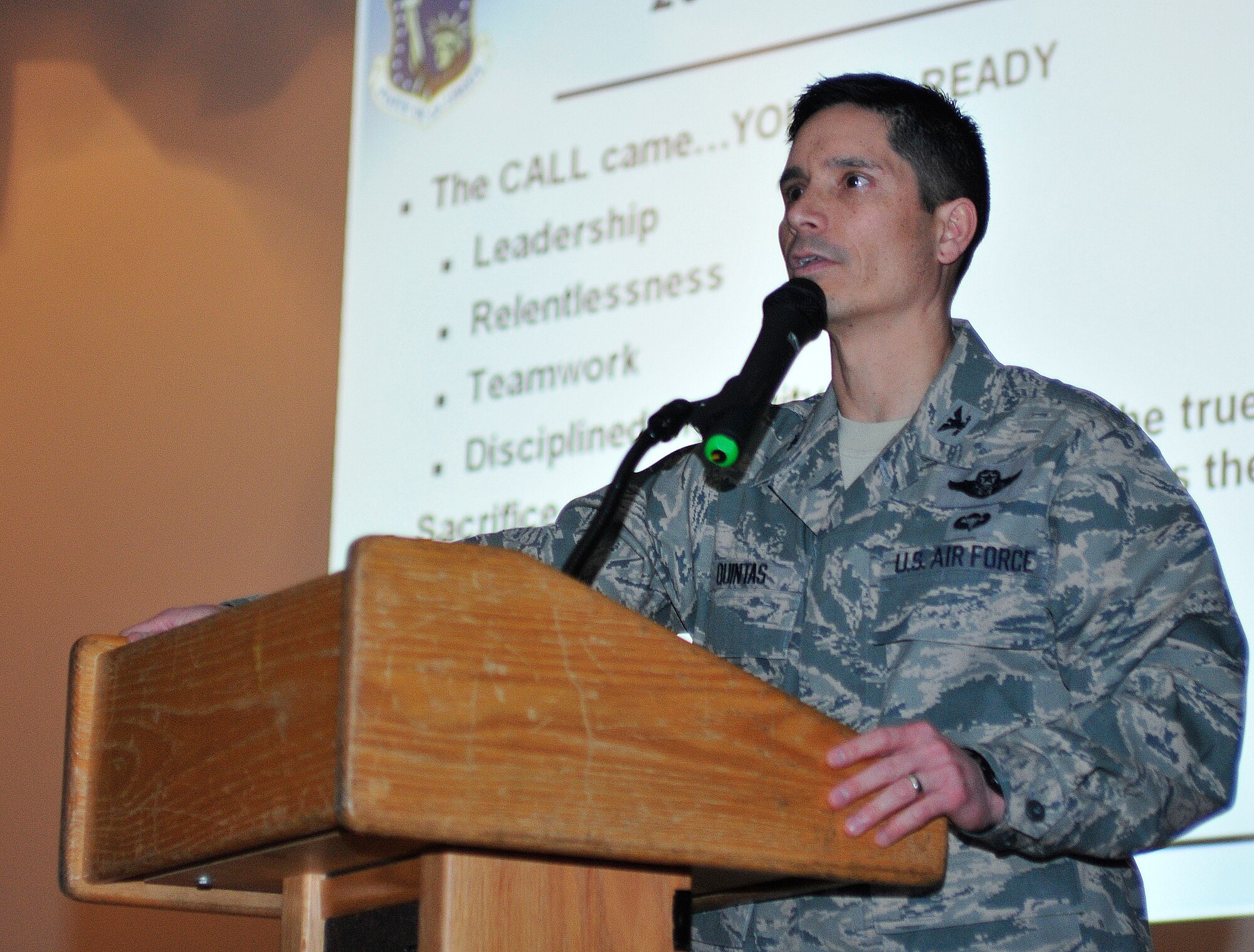 ROYAL AIR FORCE LAKENHEATH, England - Col. John Quintas, 48th Fighter Wing commander, hosts a commander's call for the Wing Staff Agency to recap 2011 at the base theater, Jan. 3, 2012. Quintas hosted commander?s calls for all groups throughout the base to kick off Wingman Day, express his thoughts on 2011 and explain his expectations for 2012. Wingman Day is about encouraging Airmen to work together as a team and to be there for their fellow Airmen. (U.S. Air Force photo by Senior Airman Tiffany M. Deuel)